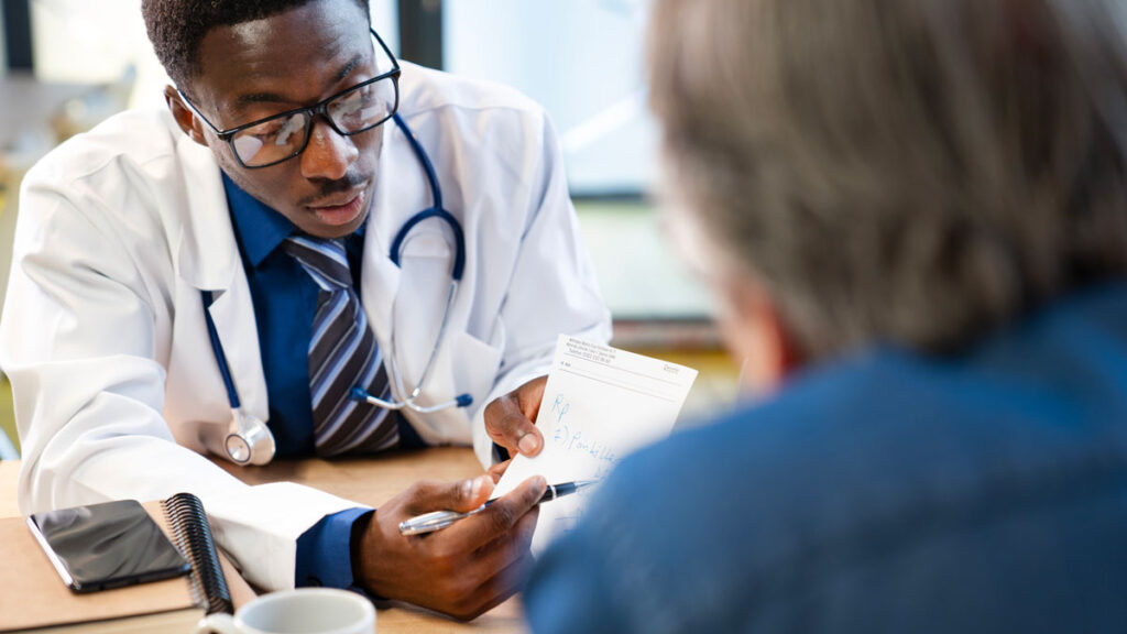 Medical examiner with patient